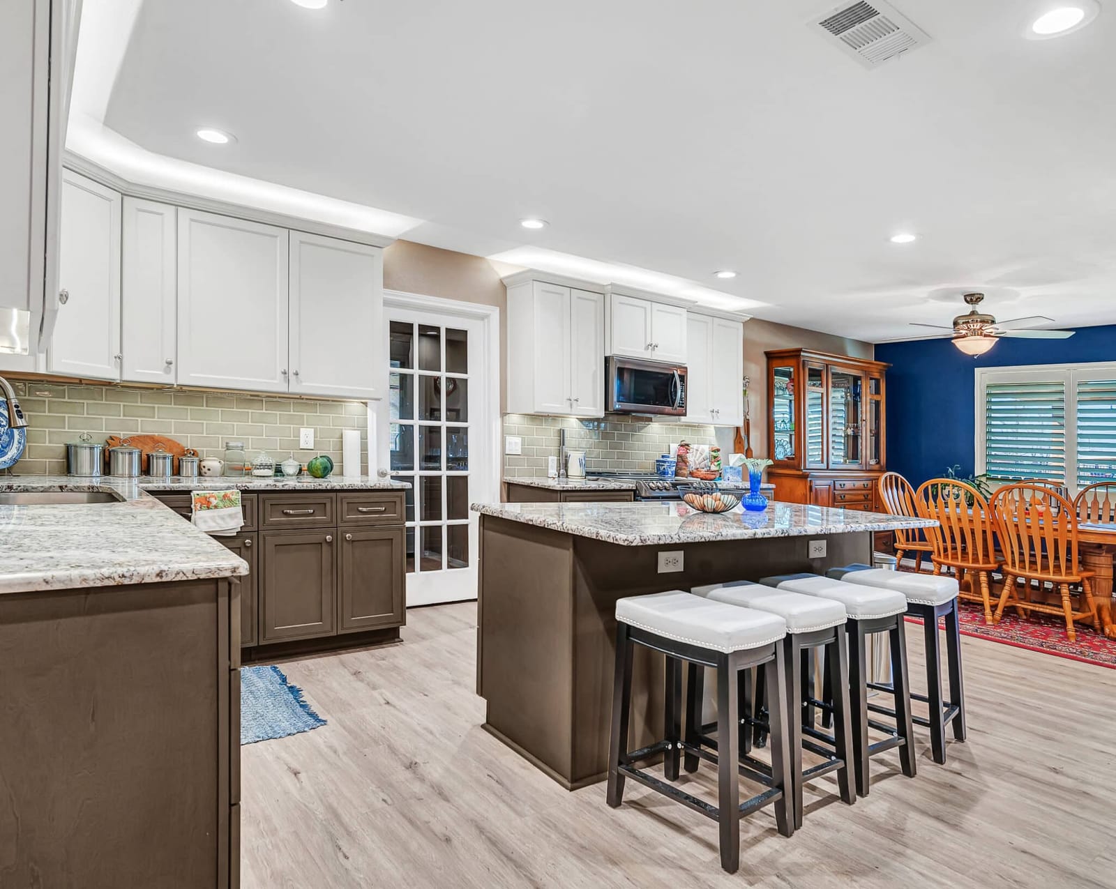 Hogge kitchen after restoration with new cabinetry, countertops and flooring