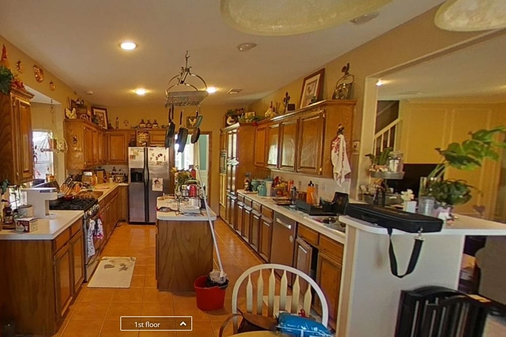 Mission Ridge kitchen before restoration, with water-damaged cabinets and flooring removed