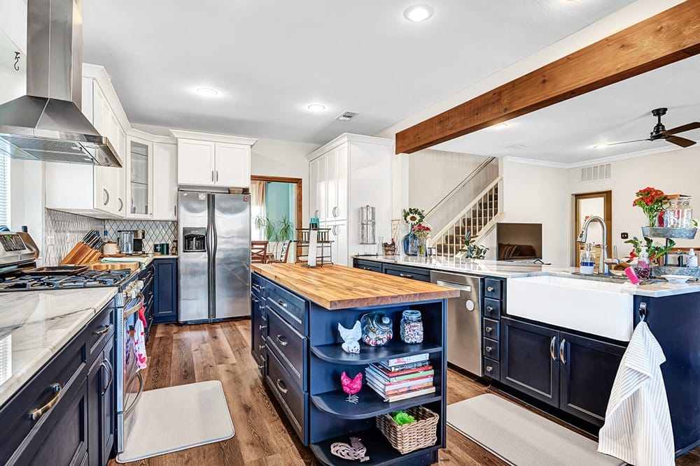 Mission Ridge kitchen after restoration, with new cabinets, island and flooring