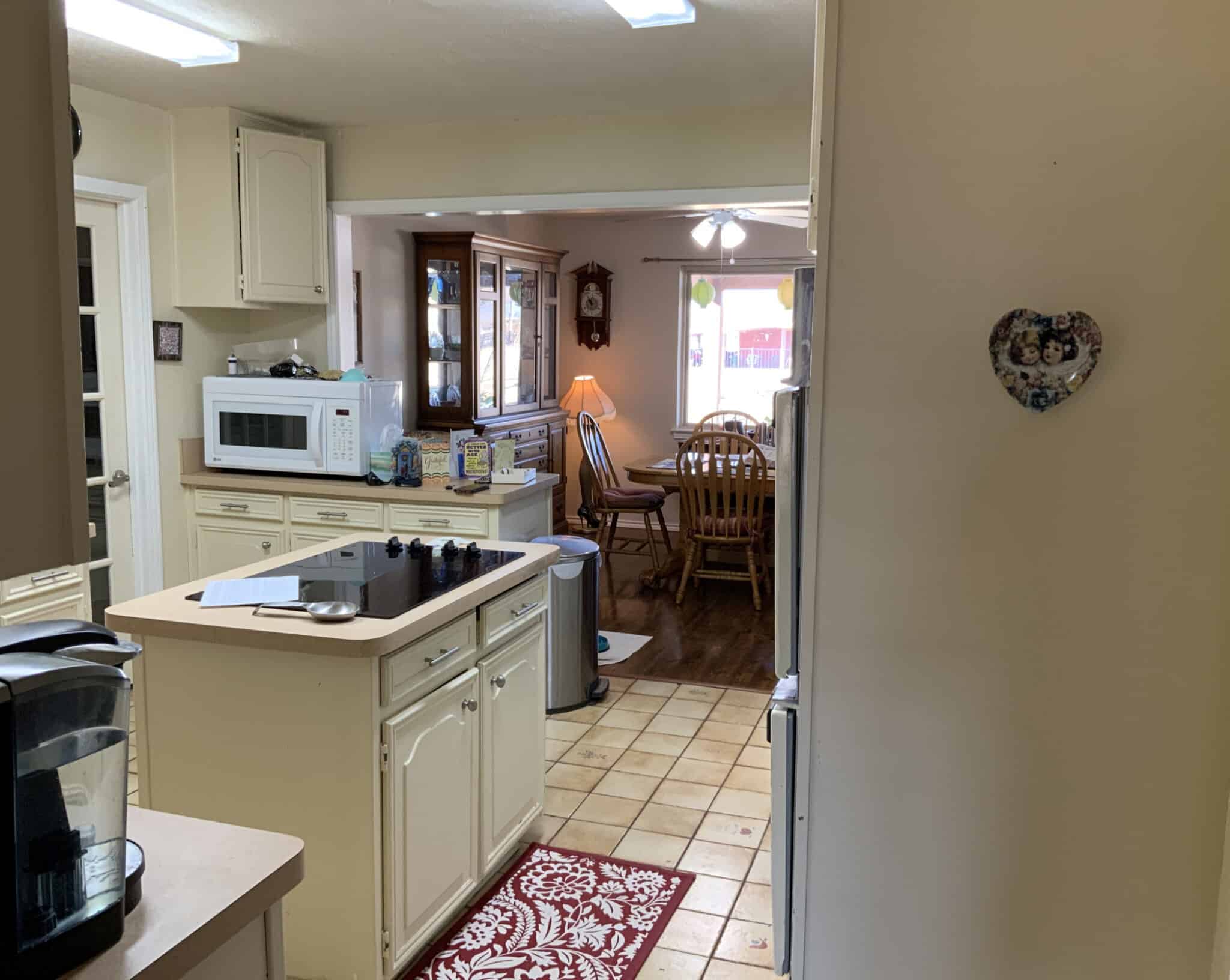Hogge kitchen before restoration, cabinets and flooring removed after water damage